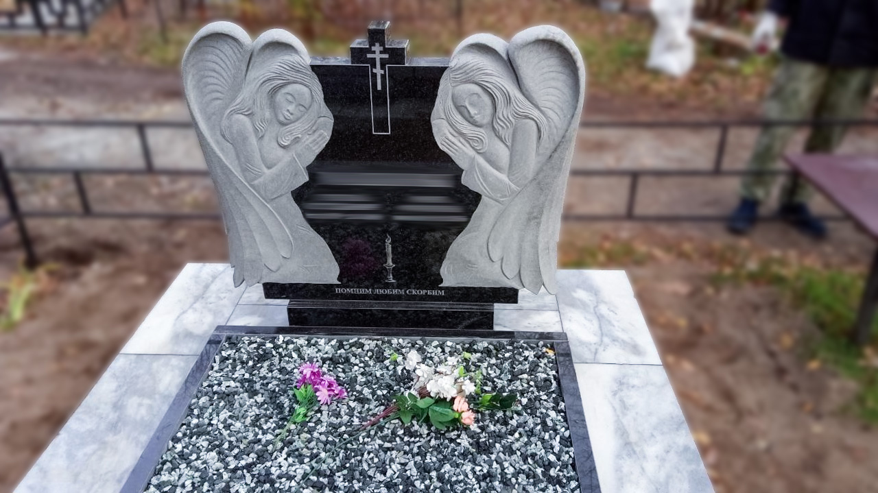 Памятник с ангелом на могилу: символ света и защиты